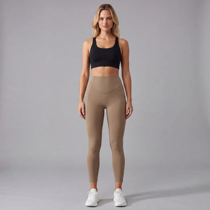 Högmidjade formande leggings med fickor