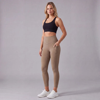 Högmidjade formande leggings med fickor