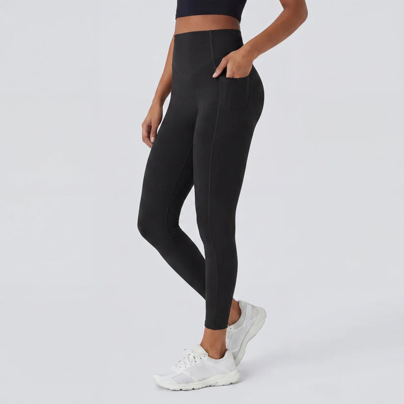 Högmidjade formande leggings med fickor