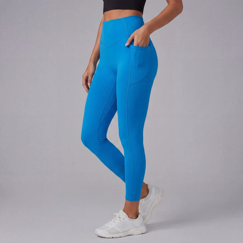 Högmidjade formande leggings med fickor
