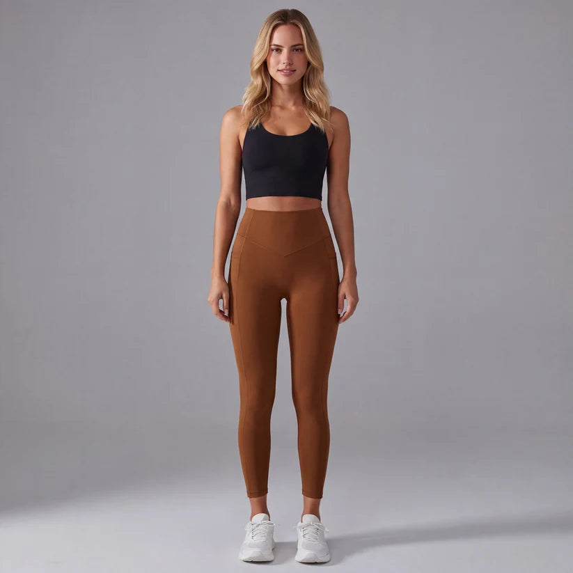 Högmidjade formande leggings med fickor