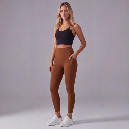 Högmidjade formande leggings med fickor